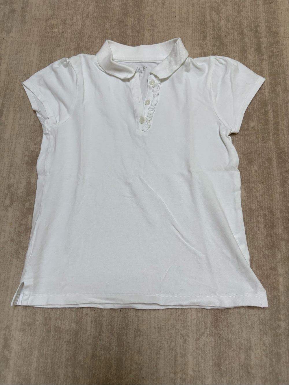 The Children's Place White Girls Polo with ruffle trim. Size M (7-8)
